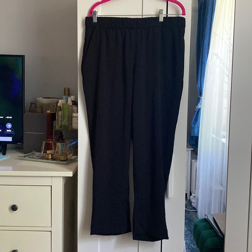 H&M black loose pants with pockets. Size 12.